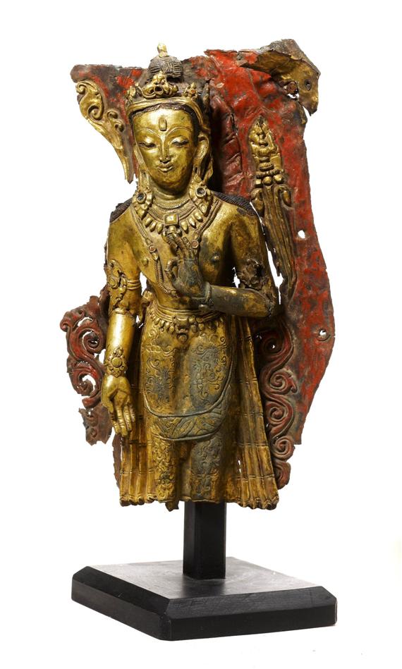 Appraisal: A GILT COPPER REPOUSS FRAGMENT OF AVALOKITESHVARA Tibet ca th