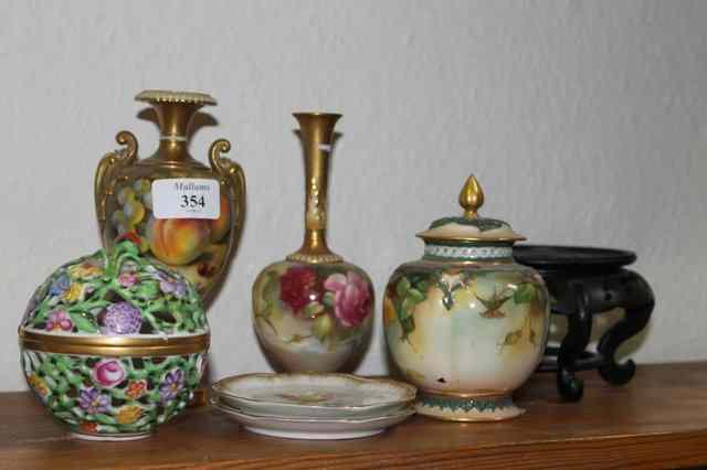 Appraisal: THREE VARIOUS PAINTED WORCESTER VASES all A F together with