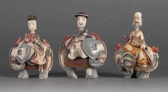 Appraisal: Three Japanese polychromed and carved ivory figural snuff bottles each