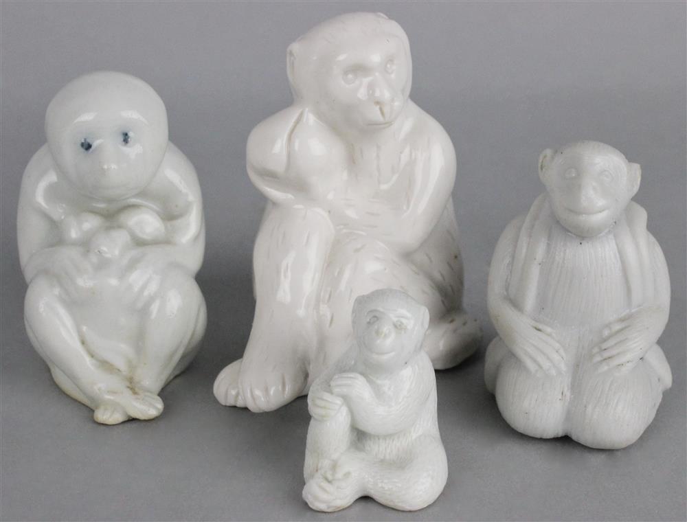 Appraisal: FOUR JAPANESE HIRADO MONKEY FIGURINES each covered with a white