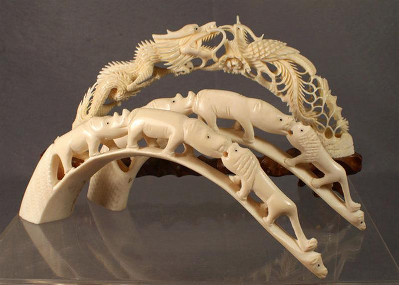 Appraisal: ivory bridge carvings dragon phoenix bird with wood base l