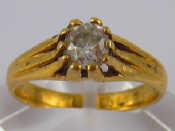 Appraisal: An antique carat gold old cut diamond solitaire ring hallmarked