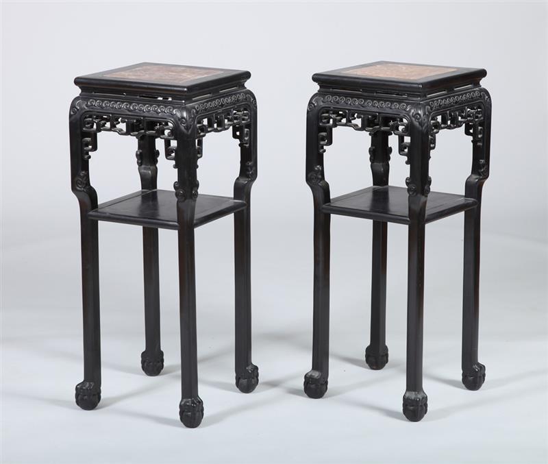 Appraisal: PAIR OF CHINESE CARVED HARDWOOD PEDESTALS Each with an inset