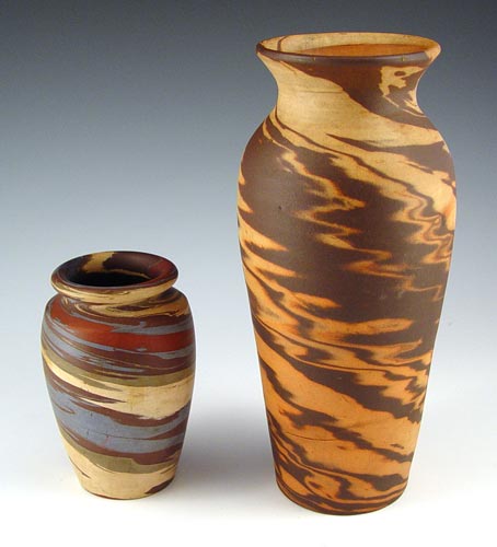 Appraisal: NILOAK ARTS AND CRAFTS ART POTTERY VASES The shorter of