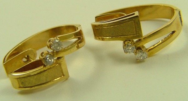 Appraisal: PAIR OF DIAMOND AND FOURTEEN KARAT GOLD EARRINGS each is