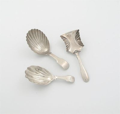 Appraisal: Three caddy spoons a William IV Fiddle example with a