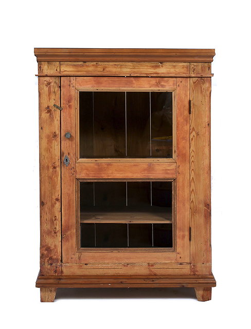 Appraisal: A PINE SIDE CABINET with single glazed door enclosing shelves