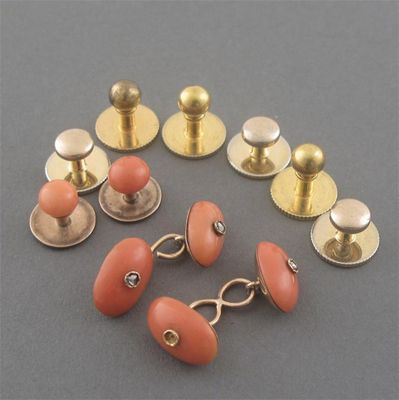 Appraisal: A pair of coral diamond and gold cuff links damaged