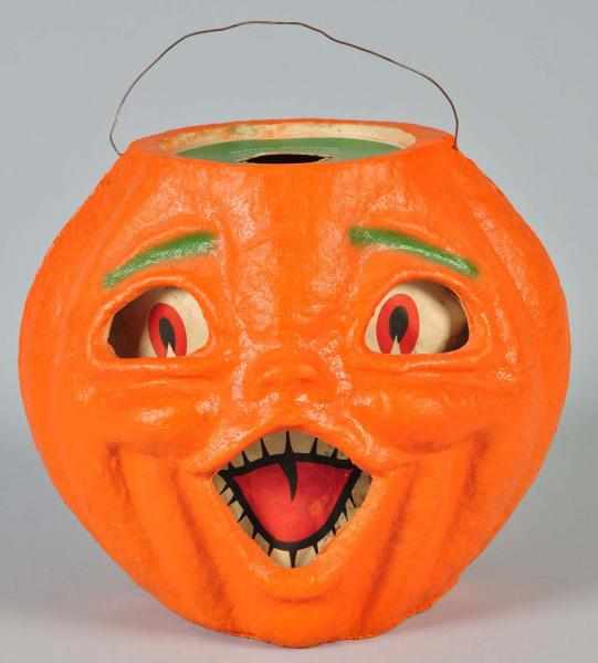 Appraisal: Pulp Halloween Double-Faced Jack-O-Lantern Description Original green insert on top