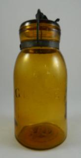 Appraisal: Fruit jar Fruit jar- 'Globe' quart yellow amber ground lip