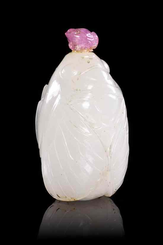 Appraisal: A Well Carved White Jade Cicada Form Snuff Bottle depicting