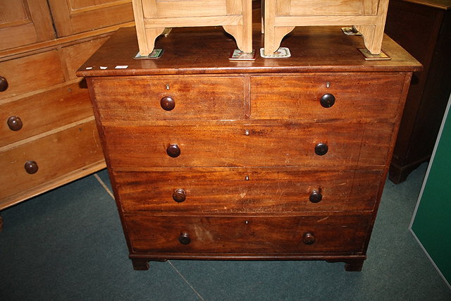 Appraisal: A MAHOGANY STRAIGHT FRONT CHEST OF DRAWERS stamped W C