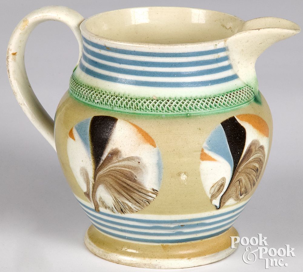 Appraisal: Mocha pitcher with fan decoration Mocha pitcher with fan decoration