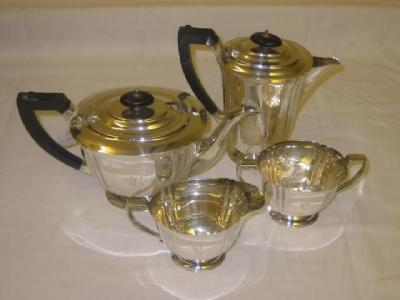 Appraisal: A FOUR PIECE TEA AND COFFEE SET of moulded oval