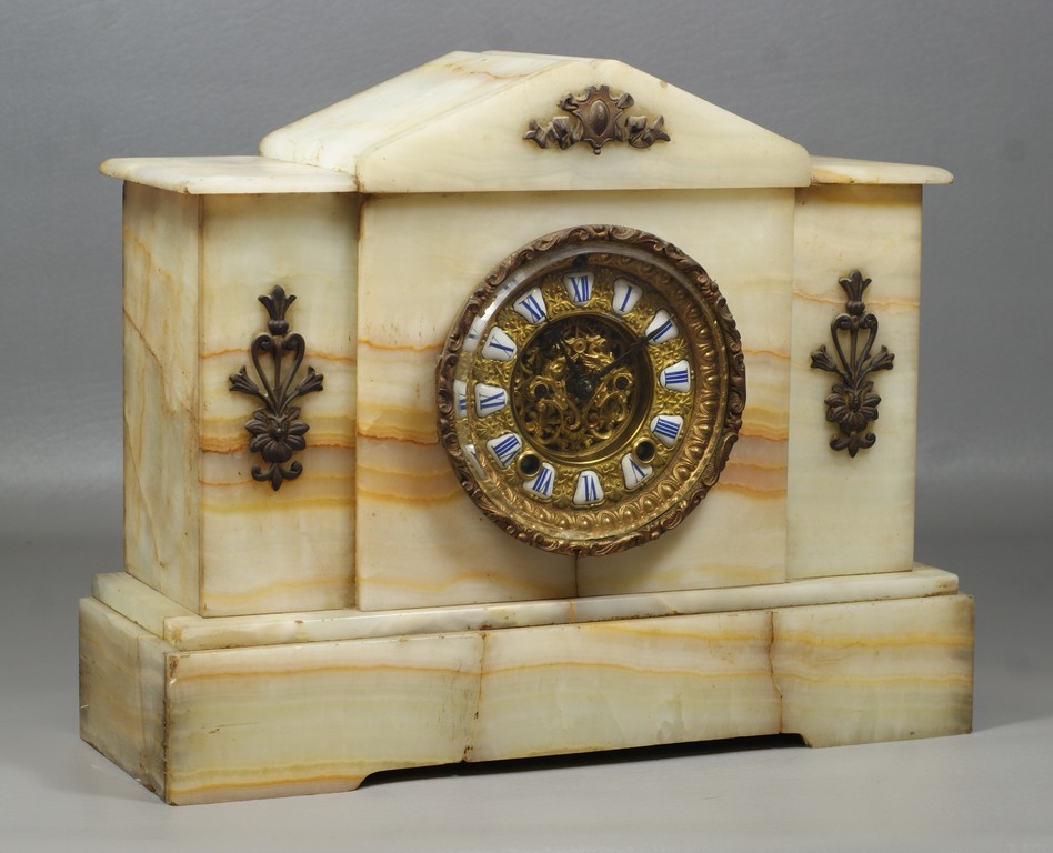 Appraisal: Ansonia alabaster mantle clock open escapement with winged griffin design