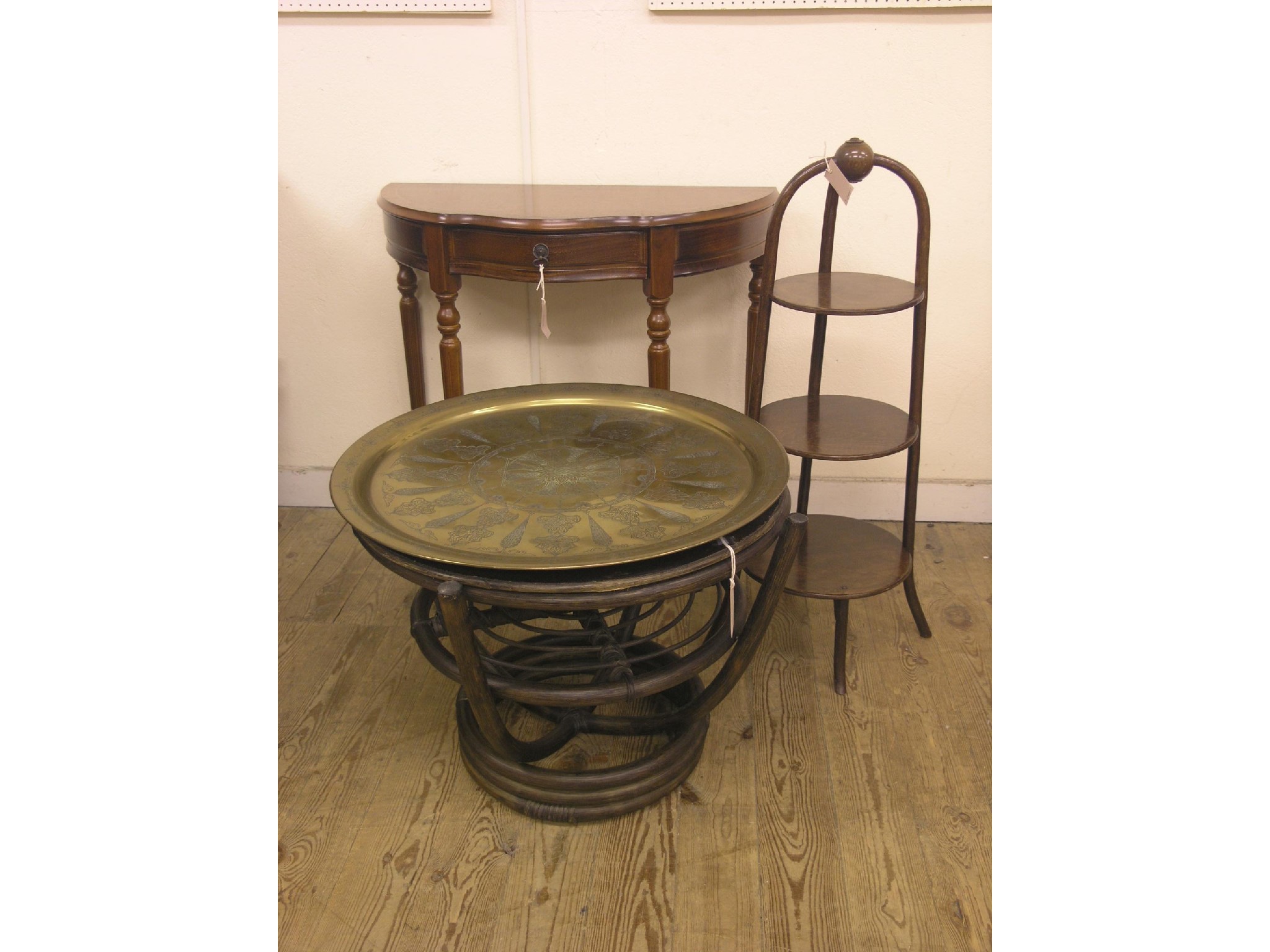 Appraisal: A reproduction mahogany hall table serpentine-shaped with single drawer on