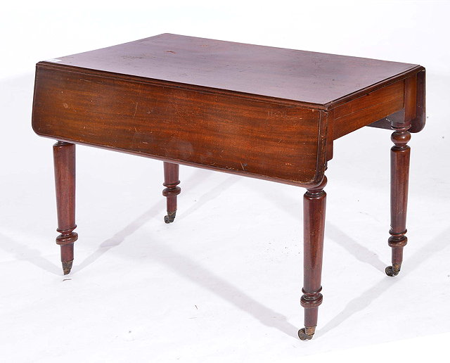 Appraisal: A VICTORIAN MAHOGANY DROP LEAF PEMBROKE TABLE on ring turned