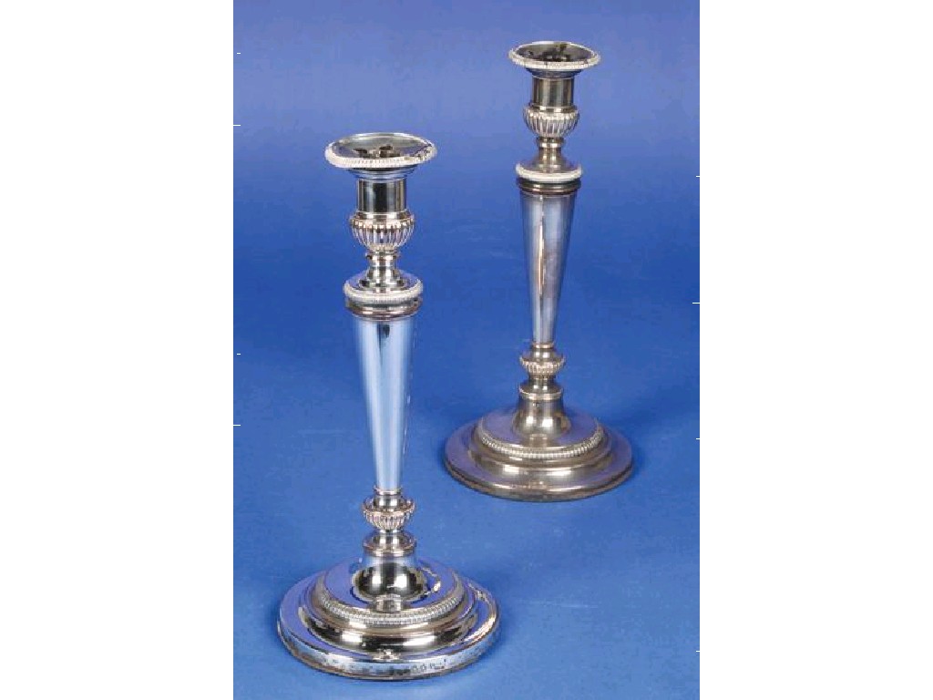 Appraisal: A PAIR OF OLD SHEFFIELD PLATE CANDLESTICKS with tapering circular