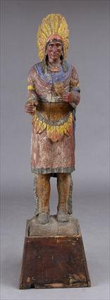 Appraisal: AMERICAN CARVED AND PAINTED CIGAR STORE INDIAN Wearing feathered bonnet