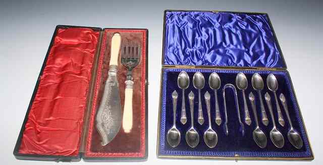 Appraisal: A CASED SET OF TWELVE SILVER PLATED TEASPOONS with sugar