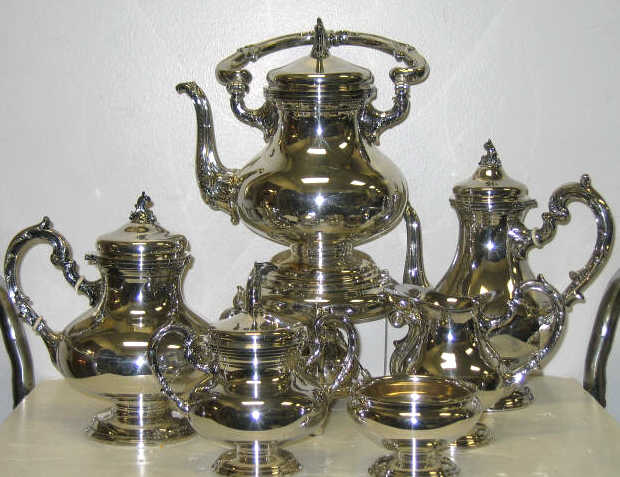 Appraisal: PERUVIAN STERLING SILVER TEA COFFEE SERVICE Comprising footed pear shape