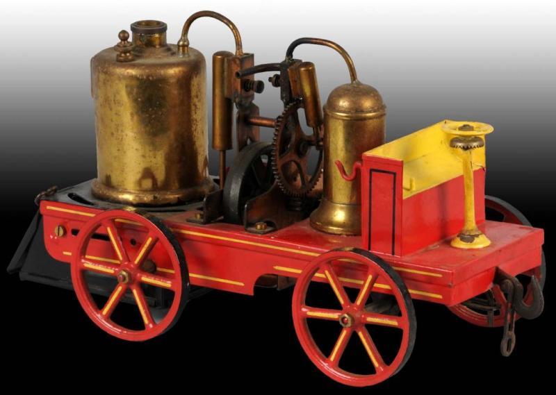 Appraisal: Bing No Fire Pumper Description Circa Vertical brass boiler with