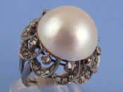 Appraisal: A white metal tests carat gold half cultured pearl and