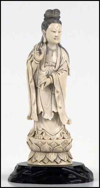 Appraisal: CHINESE CARVED IVORY FIGURE OF A QUAN YIN ON A