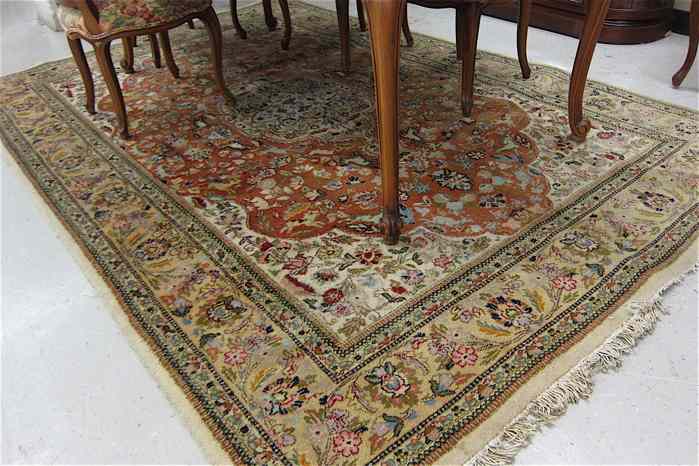 Appraisal: HAND KNOTTED ORIENTAL CARPET Indo-Tabriz flower and wildlife decoration around