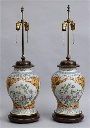 Appraisal: PAIR OF FAMILLE ROSE ENAMELED PORCELAIN VASES MOUNTED AS LAMPS