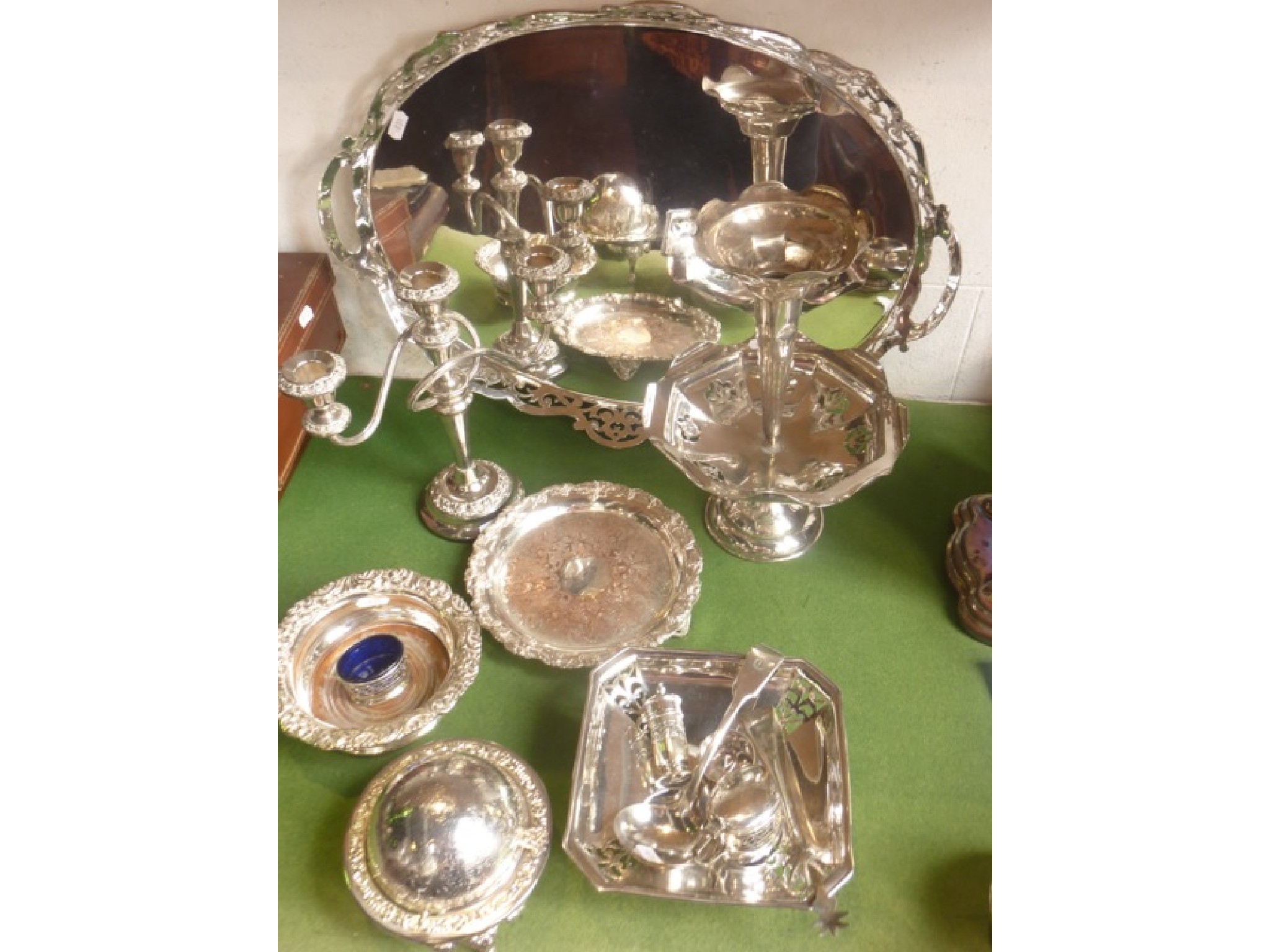 Appraisal: A silver plated tray of oval form with pierced shaped