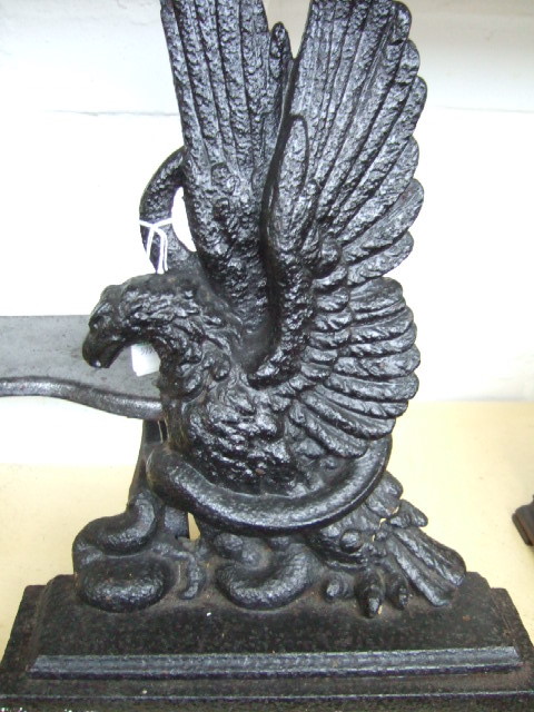 Appraisal: A Victorian cast iron flat back door stop modelled as