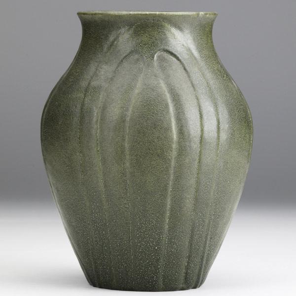 Appraisal: GRUEBYUnusual matte green bulbous vase with incised leavesCircular Pottery stamp