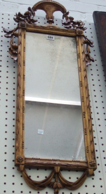 Appraisal: A th century giltwood pier glass with trophy surmount and