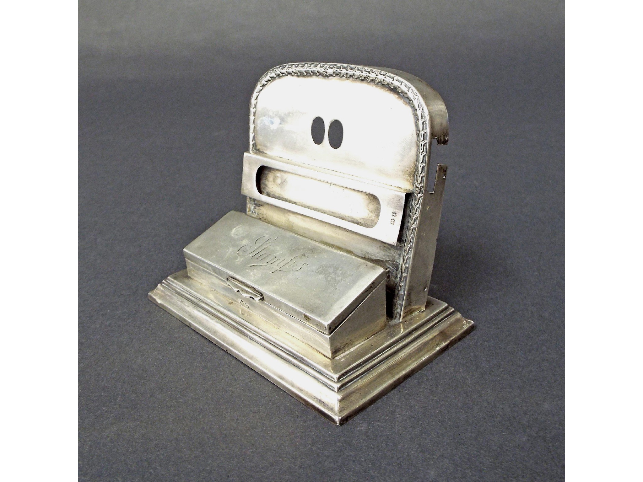 Appraisal: s silver desk tidy with hinged stamp box and calendar