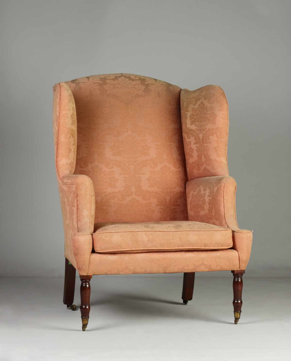 Appraisal: Period Sheraton Wing Chair Turned mahogany legs ending in brass