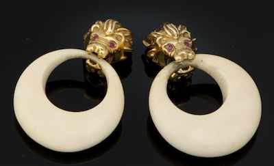 Appraisal: A Pair of Carved Ivory and Lion Head Gold Door