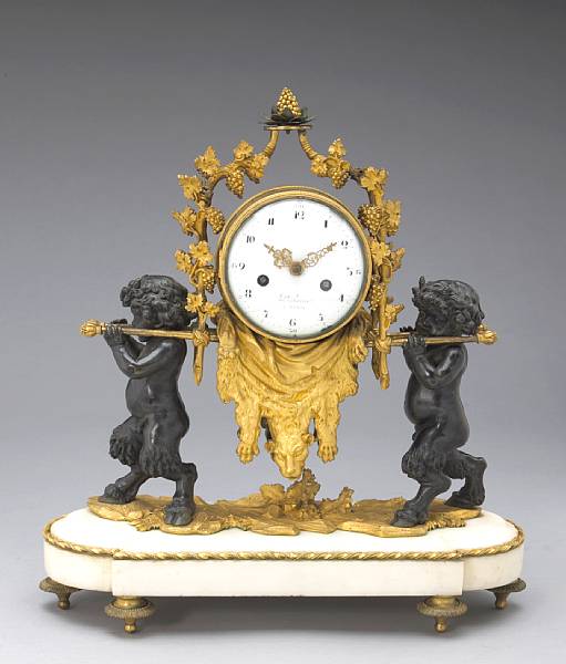 Appraisal: A Louis XVI gilt and patinated bronze and white marble