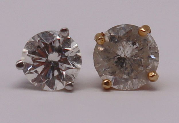 Appraisal: JEWELRY Single Unmatched Diamond Studs Includes a single kt yellow