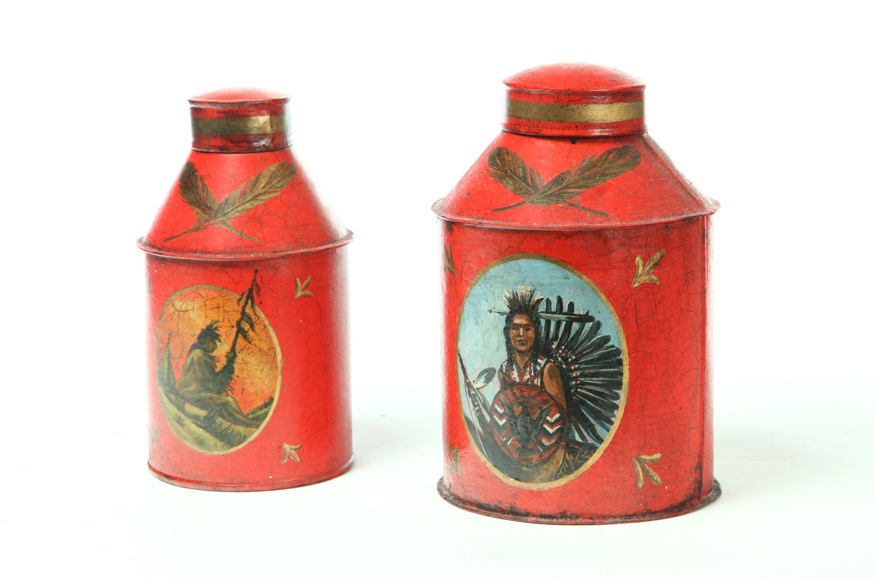 Appraisal: TWO TOLE TEA CADDIES American mid th century Cylindrical with