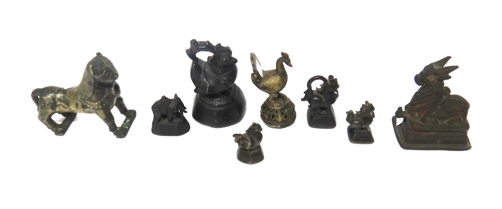 Appraisal: A group of four Burmese bronze duck and animal opium