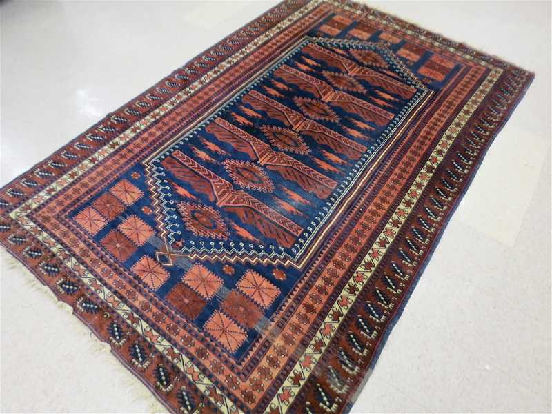 Appraisal: HAND KNOTTED ORIENTAL CARPET Afghan Beloch tribal overall geometric pattern