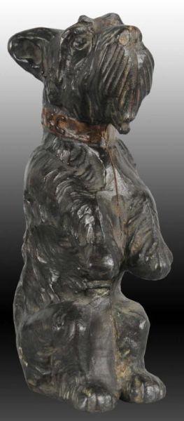 Appraisal: Sitting Up Scottie Dog Cast Iron Doorstop Description Full-figure Marked