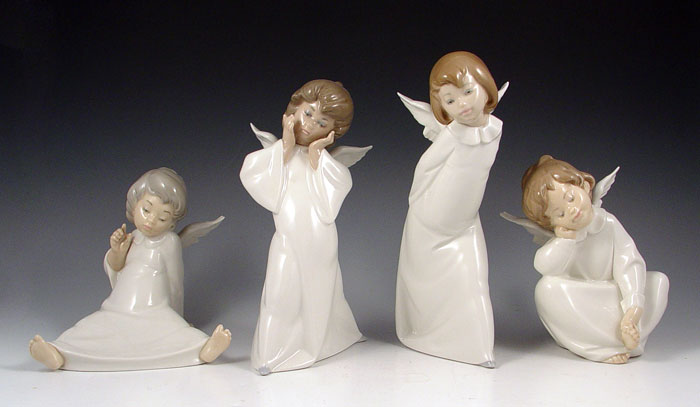 Appraisal: LLADRO CHERUB ANGEL FIGURES To include Smiling Cherub '' high