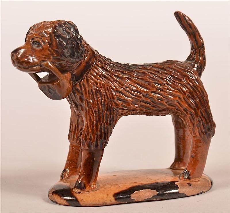 Appraisal: Glazed Redware Pottery Figure of a Dog Glazed Redware Pottery