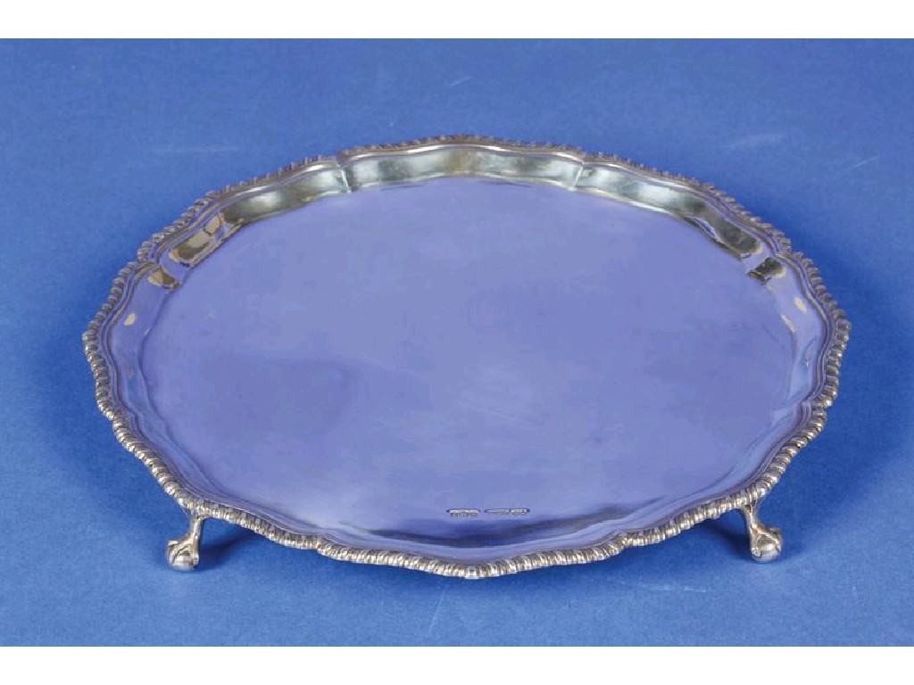 Appraisal: A SALVER of shaped circular form with a raised gadrooned