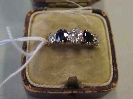 Appraisal: A gold sapphire and diamond set five stone ring mounted