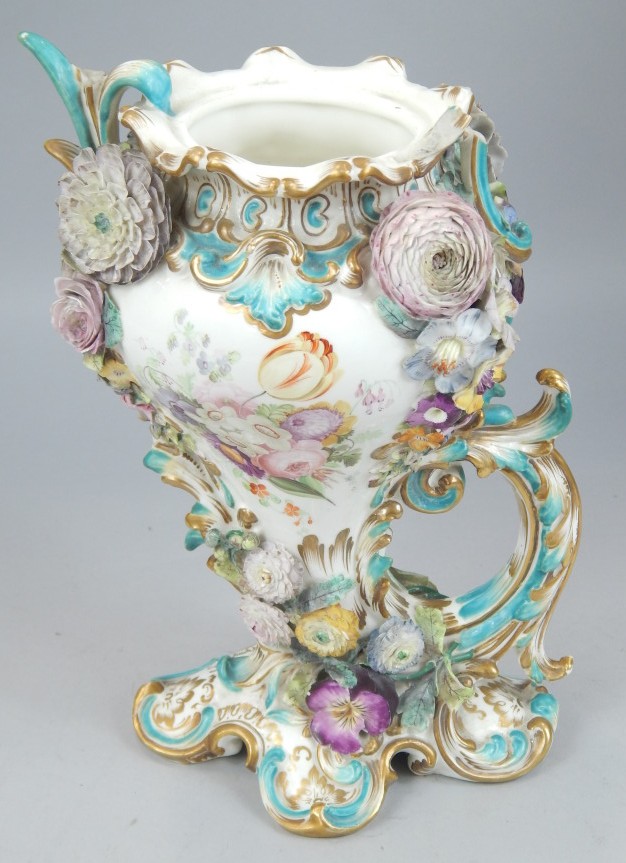 Appraisal: A thC Staffordshire porcelain vase painted and flower encrusted with