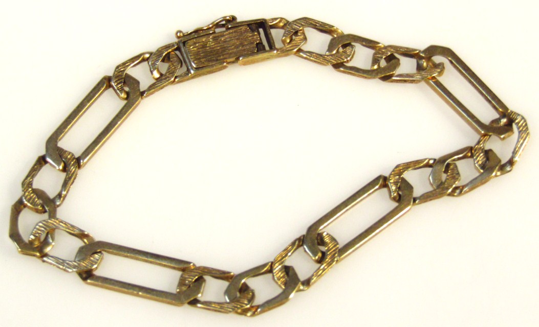 Appraisal: A ct gold fancy link bracelet with hexagonal links broken