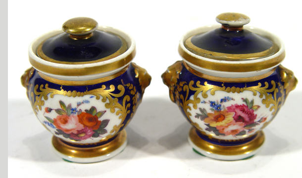 Appraisal: Pair of miniature English th Century pottery vases and covers